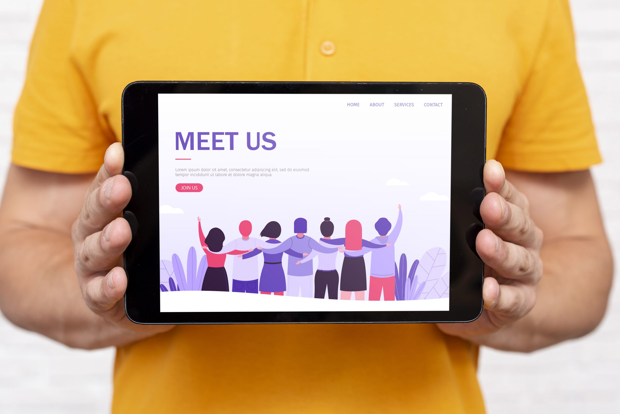 Man holding a tablet that reads "Meet us"